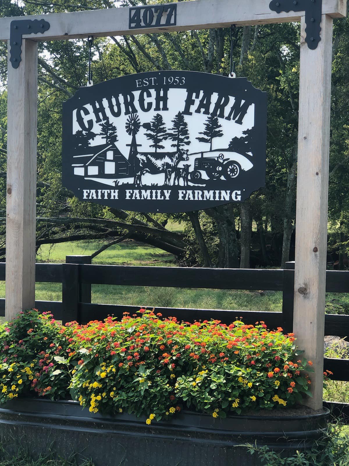 Church Farm sign at 4077 Rippey Lake Road, established 1953. Faith, family, farming.